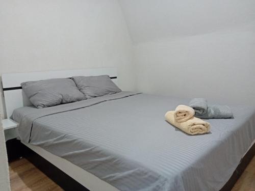 Postel nebo postele na pokoji v ubytování Urban Square