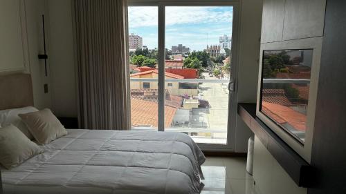 Postel nebo postele na pokoji v ubytování Monoambiente moderno y comodo