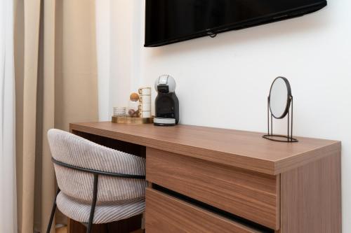 The Elysium Roomsにあるテレビまたはエンターテインメントセンター