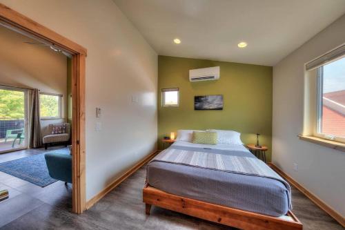 a bedroom with a large bed in a room at Stylish Casita Moab 2 - In Town, Outdoor Sauna in Moab