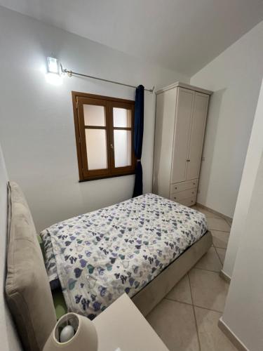 Postel nebo postele na pokoji v ubytování Appartamento situato nella galleria dello Shopping