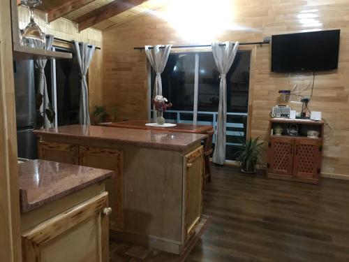 Una cocina o cocineta en Altos de Ñida