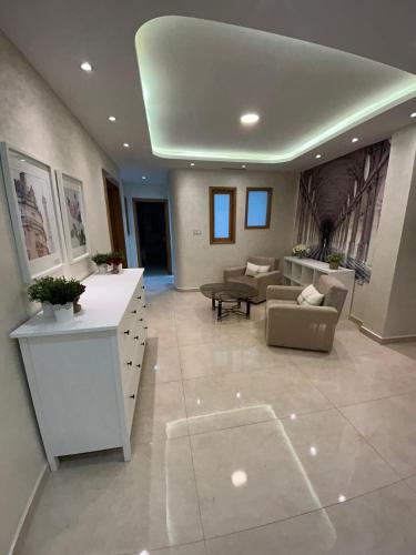 Posezení v ubytování O' appartement Alhoceima