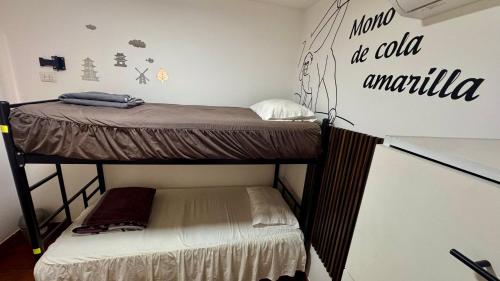 Postel nebo postele na pokoji v ubytování Hostel Prada