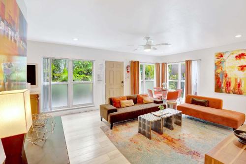 a living room with a couch and a table at 320-1 Las Olas Boulevard in Fort Lauderdale