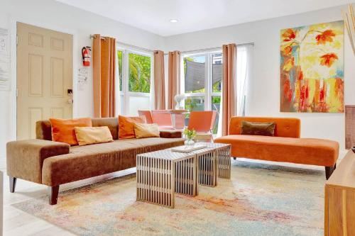 a living room with a couch and a table at 320-1 Las Olas Boulevard in Fort Lauderdale
