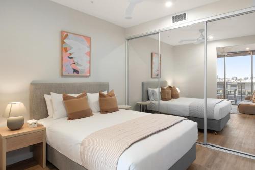 Кровать или кровати в номере Urban Rest South Brisbane