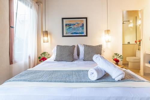 Postel nebo postele na pokoji v ubytování Casa De Anfitrite Apartahotel