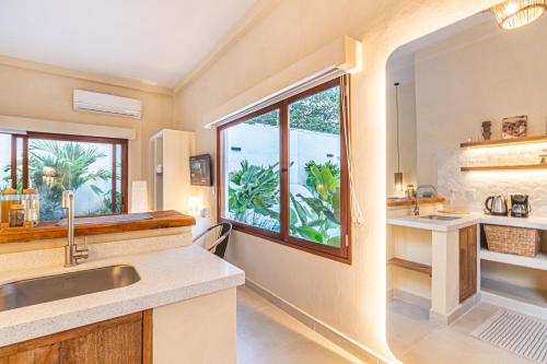 Kuchyň nebo kuchyňský kout v ubytování Casa De Anfitrite Apartahotel