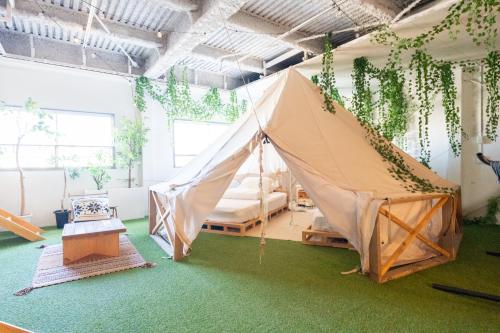Фотография из галереи CREA BASE -Indoor Glamping Retreat- в Токио