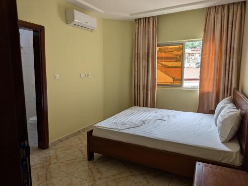 Postel nebo postele na pokoji v ubytování Résidence Romacy, appartement 2 chambres avec balcon à Ahala, quartier résidentiel de Yaoundé