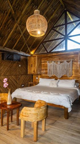 Hotel Isla Mucuraにあるベッド