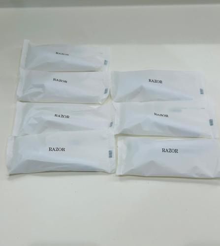 a group of white envelopes sitting on a table at 一棟貸しゲストハウス マリドール in Izumo