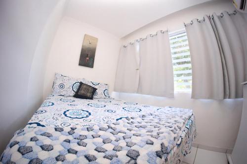 Ένα ή περισσότερα κρεβάτια σε δωμάτιο στο Flat Aconchego BEIRA-MAR térreo quase pé na areia