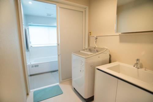 Bilik mandi di machiyado Oranchi Mirai -Japanese Style Stay with Private Sauna-