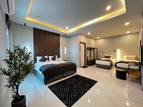 Ένα ή περισσότερα κρεβάτια σε δωμάτιο στο La Villa Pool Krabi