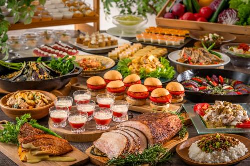 a buffet with many different types of food and drinks at Art Hotel Narita in Narita