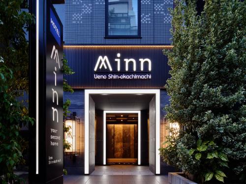 a entrance to a building with a sign on it at Minn Ueno Shin-Okachimachi in Tokyo