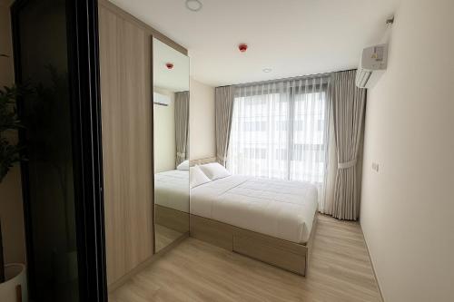 Billede fra billedgalleriet på Minimal Cozy Stay 2 Mins to Si Dan MRT 14nights minimum i Bang Na