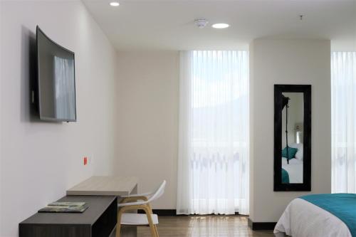 Arame Hotelにあるテレビまたはエンターテインメントセンター
