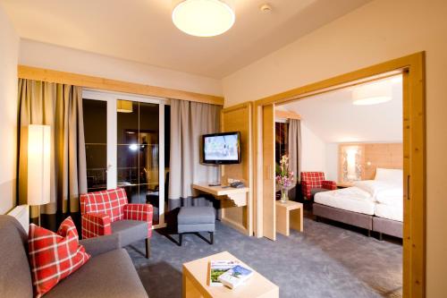 Posteľ alebo postele v izbe v ubytovaní Hotel Feldwebel