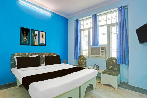 Μια τηλεόραση ή/και κέντρο ψυχαγωγίας στο Super Collection O Bani Park Near Collectorate Circle Formerly Anuja Palace