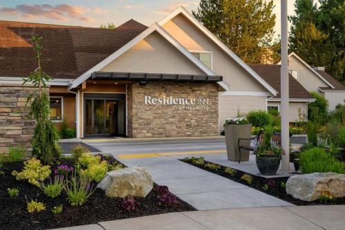 a building with a sign that reads restoration inn at Residence Inn by Marriott Boise Downtown/University in Boise
