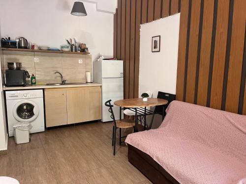 Kuchyň nebo kuchyňský kout v ubytování WOOD STUDIO