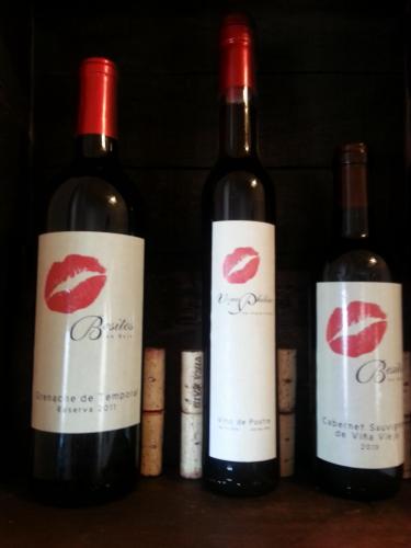 three bottles of wine with lips on them at Vinofilia Wine Country Inn in Valle de Guadalupe