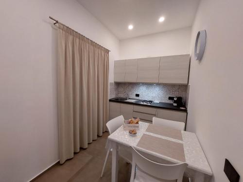 Η κουζίνα ή μικρή κουζίνα στο I Mori Apartments