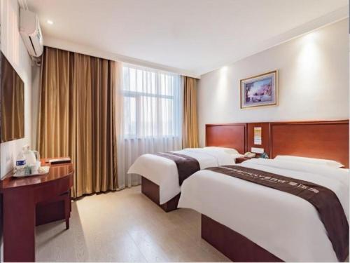 Letto o letti in una camera di GreenTree Inn Beijing Tonzhou Maju Bridge No.2 Express Hotel