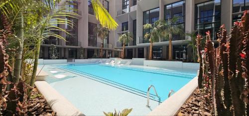 Chic Duplex 1BHK by CzechIn Luxe Stay with Pool Gym