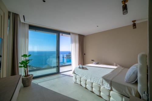 Ένα ή περισσότερα κρεβάτια σε δωμάτιο στο Villa Atlantic Private Pool