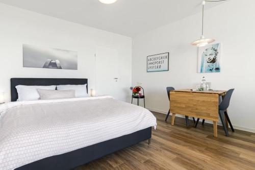 Katil atau katil-katil dalam bilik di Ferienwohnung Stranddistel am Südstrand