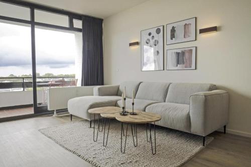 Χώρος καθιστικού στο Traumhaftes Strand-Apartment mit Meerblick