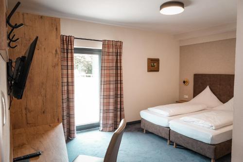 Postel nebo postele na pokoji v ubytování Bad Resort