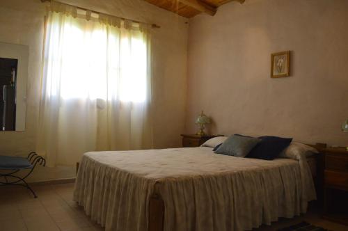 Giường trong phòng chung tại Ecos del Valle