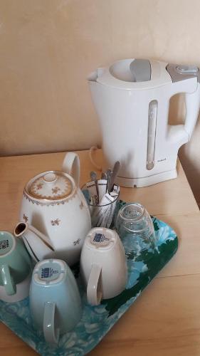 Удобства за правене на кафе и чай в Sûn Chambres d'hôtes