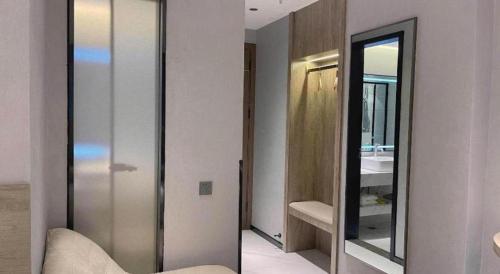 Ένα μπάνιο στο 7 Days Inn Deyang Zhongjiang Kuishan Park