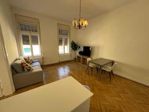 a living room with a couch and a table at Marschall 8 in Graz