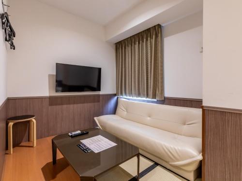 Televisyen dan/atau pusat hiburan di Hotel Excellence Enmachi Ekimae