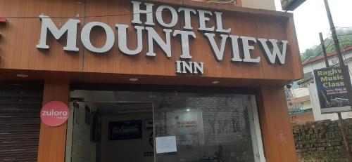 a hotel mount view sign on the front of a building at Hotel Mount view inn in Rishīkesh