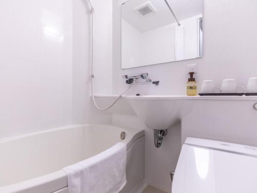 Bilik mandi di Hotel Excellence Enmachi Ekimae