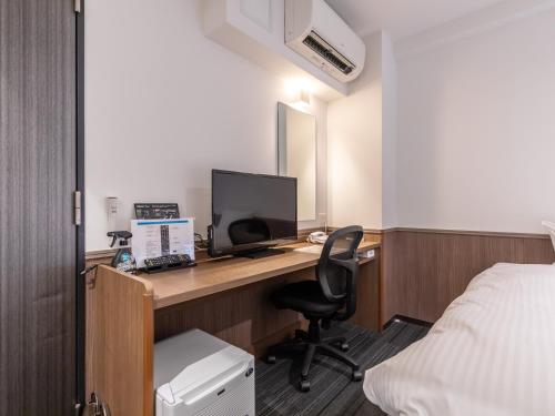 Televisyen dan/atau pusat hiburan di Hotel Excellence Enmachi Ekimae