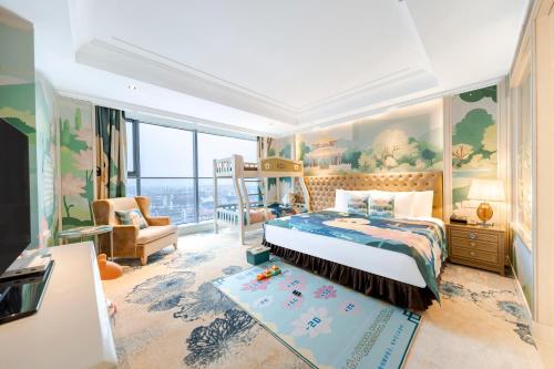 a bedroom with a king sized bed and a living room at Tonino Lamborghini Hotel Kunshan City Center in Kunshan