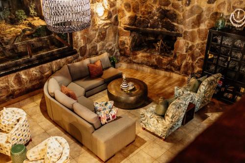 Χώρος καθιστικού στο Dinkweng Safari Lodge