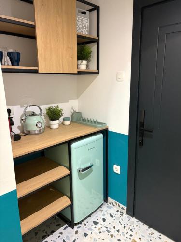 Kuchyň nebo kuchyňský kout v ubytování Bloom Boutique Hotel