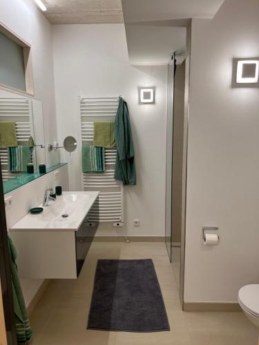 Koupelna v ubytování FerienSuiten DeLuxe Weissensee