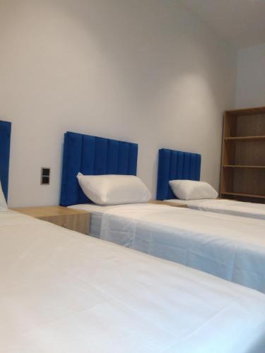 Appartement Calme M'diqにあるベッド