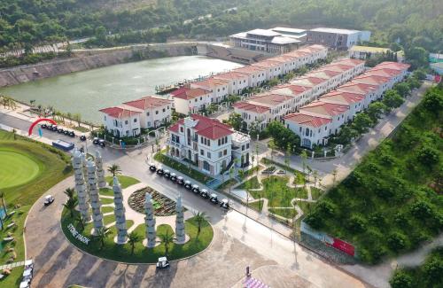 an aerial view of a city with a river and buildings at Swiss-Belvillas Solavita Binh Tien in Binh Tien